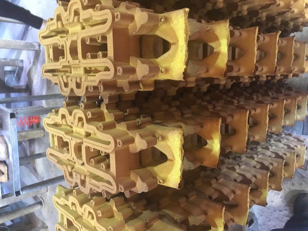 ダクタイル鋳鉄 GGG50 シェル モールディング砂型鋳鉄 農業機械用トラックおよびクローラ ベルト用コア アイアン